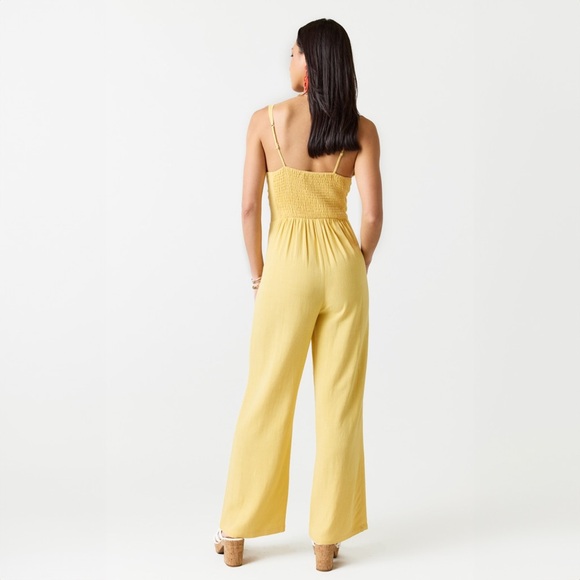 Francesca’s Yellow Twist Front Jumpsuit - Picture 2 of 3